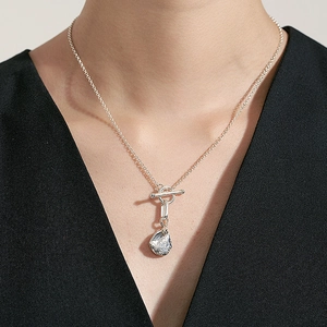 925 sterling silver necklace with irregular lava pendant and toggle clasp on model