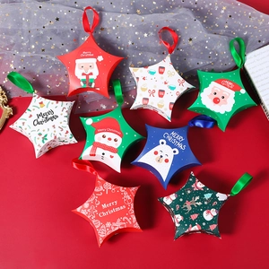 Set of creative star-shaped Christmas candy gift boxes with festive patterns and ribbons