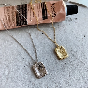 Irregular hammered geometric pendant necklaces in gold and silver finish with slim chains