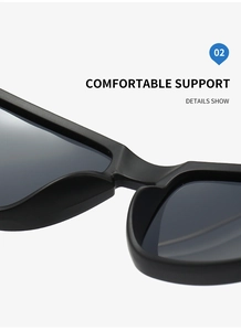 Macro detail of ergonomic nose pads on matte black polarized sports sunglasses for comfort