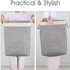 Detailed view of grey fabric laundry basket with thick hemp rope handles for easy carrying