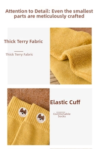 Detailed view of thick terry lining and elastic cuffs on yellow dog embroidery socks