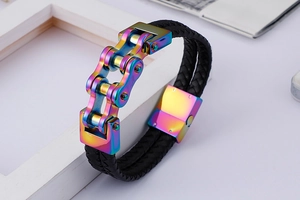 Detail of rainbow bicycle chain buckle with black double-braid leather bracelet strap