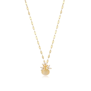 Gold flower necklace with opal cat eye and zircon stone pendant on white background