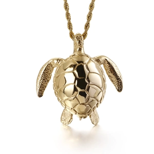 Golden stainless steel sea turtle pendant necklace with detailed shell texture on rope chain