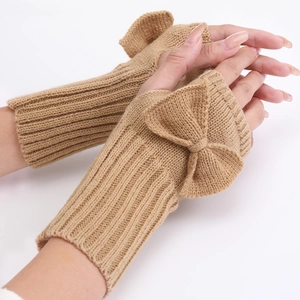 Short knitted fingerless gloves for women with bow accent in camel brown color