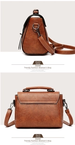 Detail of vintage brown PU leather crossbody bag with contrast white stitching
