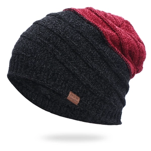 Close-up of thick chenille knit texture and leather label on winter beanie hat