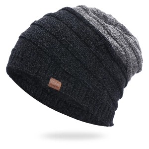 Detail of winter knit hat featuring warm fleece lining and textured striped pattern