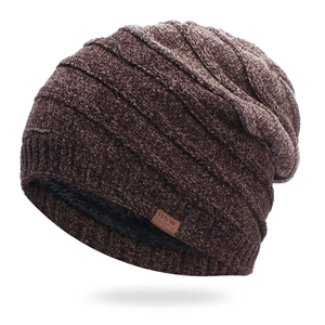 Detail view of the soft chenille knit texture and warm fleece lining of the beanie