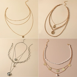 Collage showing four styles of layered hip hop necklaces in gold and silver finishes