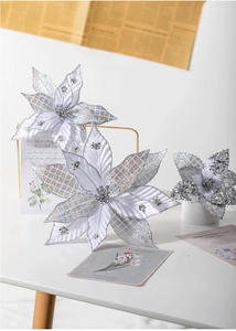 Close-up of 30cm silver artificial Christmas flowers with glitter sequins and bead centers