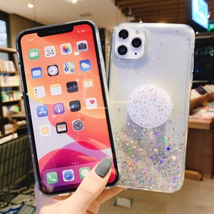 Detail of glitter starry iPhone case with holographic stars and matching pop socket grip