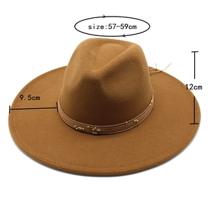 Detail of camel wool fedora hat featuring triple-strand rope and gold bead trim
