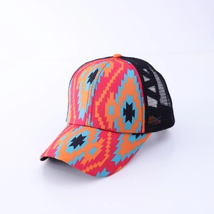Outdoor trucker hat with orange geometric ethnic pattern and breathable black mesh back