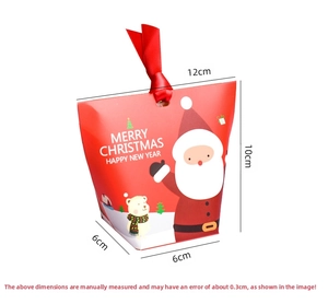 Detailed view of red Christmas gift bags with Santa and polar bear motifs and dimensions