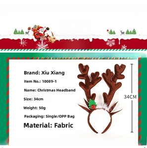 Detail of Christmas reindeer headband featuring small trees, bells, and 34cm dimensions