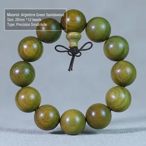 Makro-Detail von 20mm Argentinien-Grünholz-Perlen mit natürlicher Maserung und Handknoten
