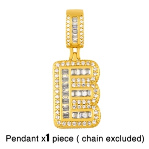 Macro detail of gold-plated letter B pendant with micro-pave cubic zirconia stones