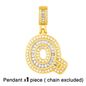Macro detail of gold-plated letter Q pendant with baguette and round cubic zirconia stones