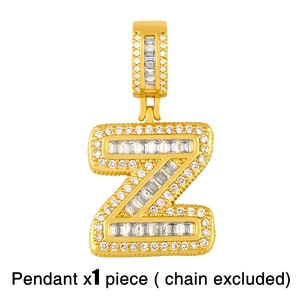 Detailed view of hip hop style letter Z pendant with gold plating and iced out cubic zirconia