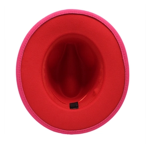 Detail of two-tone wool fedora showing cotton-polyester label and red interior lining