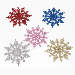 Detailed view of colorful 12cm glitter snowflake ornaments for Christmas tree decoration