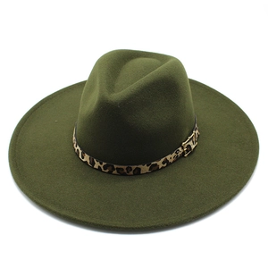 Detail view of dark green wool fedora with a leopard print band and gold buckle