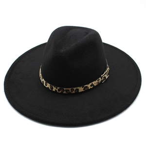 Detail showing black felt fedora with leopard print band and golden metal buckle accessory