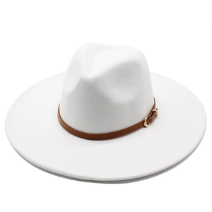 Close-up of a white wool felt fedora featuring a brown leather band and gold buckle detail
