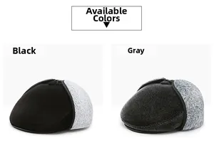 Detail view of winter earflap flat caps in black and grey with thick fleece lining