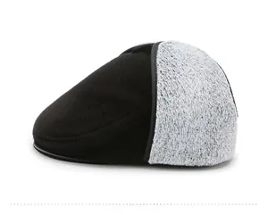 Side view of winter newsboy cap featuring black velvet front and grey tweed fabric texture