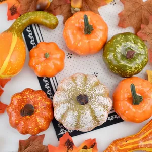 Realistic Halloween pumpkins with pine cones and maple leaves on a white floral cloth