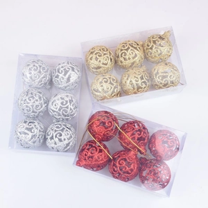 Set of hollow Christmas balls in gold silver and red with glitter for tree decoration