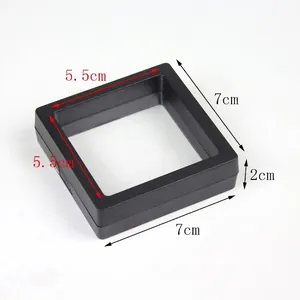 Macro detail of 7x7cm black jewelry display box with transparent PE film and frame dimensions