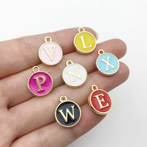 Colorful enamel alphabet charms in gold finish for DIY jewelry making and bracelets