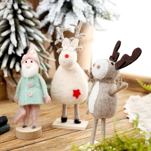 Christmas wool felt reindeer and gnome desktop decorations with wooden bases