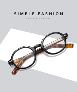 Detail of stylish black frames with tortoiseshell temples and blue light filtering lenses