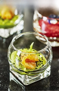 Macro view of high quality crystal glass dessert bowl with a solid square base