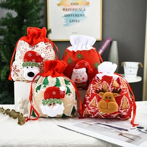 Set of Christmas fabric drawstring gift bags with 3D reindeer and snowman characters