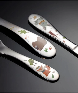 Detail of 304 stainless steel cutlery handles with cute cartoon fox, squirrel and rabbit