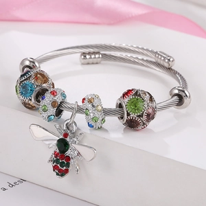 Classic stainless steel twisted bangle featuring colorful rhinestone charms and bee pendant
