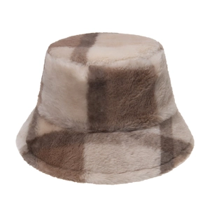 Close-up of plush faux fur texture and classic plaid pattern on the winter bucket hat