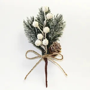 Christmas pine needle bouquet with frosted white berries and natural pine cone decoration