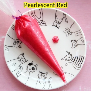 Pearlescent bright red DIY cream glue in piping bag with star shaped sample