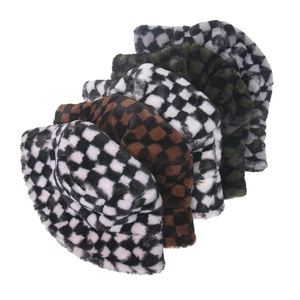 Detail showing plush checkerboard pattern bucket hats in multiple stylish winter colors