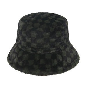 Detail of green and black checkered faux fur bucket hat showing plush texture