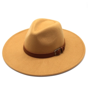 Detail view of khaki wool felt fedora featuring a wide brim and brown leather buckle band