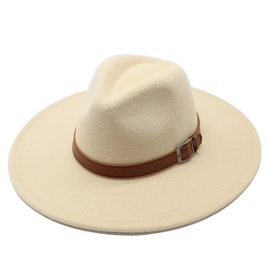 Detail of wide brim wool fedora hat with brown leather strap and silver metal buckle