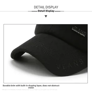 Detail of sturdy baseball cap brim with JEANS embroidery and built-in shaped interlayer
